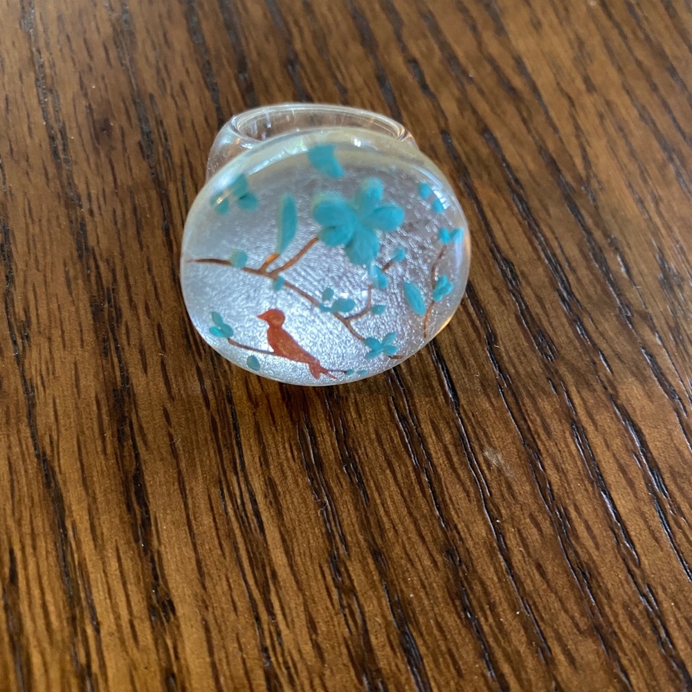 Clear resin ring with bird